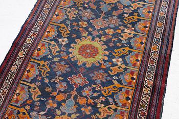 A north-west Persian, semi-antique runner, c. 340 x 110 cm.