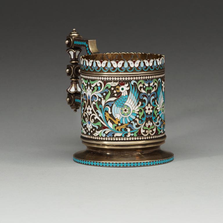 A Russian silver-gilt and enamel tea-glass holder, makers mark of Chlebnikov, Moscow 1892. Imperial Warrant.