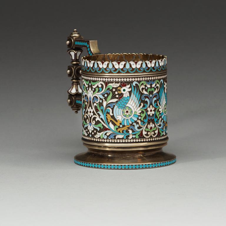 A Russian silver-gilt and enamel tea-glass holder, makers mark of Chlebnikov, Moscow 1892. Imperial Warrant.