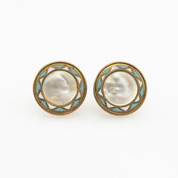 Shirt buttons made of brass with decoration of enamel and mother-of-pearl, early 20th century.