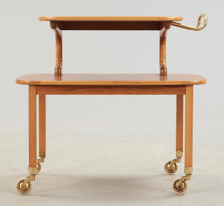 A Josef Frank walnut and mahogany serving trolley, Svenskt Tenn, probably 1950's.