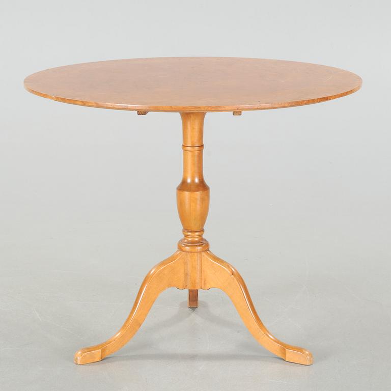 A folding table, made in the first half of the 20th century.