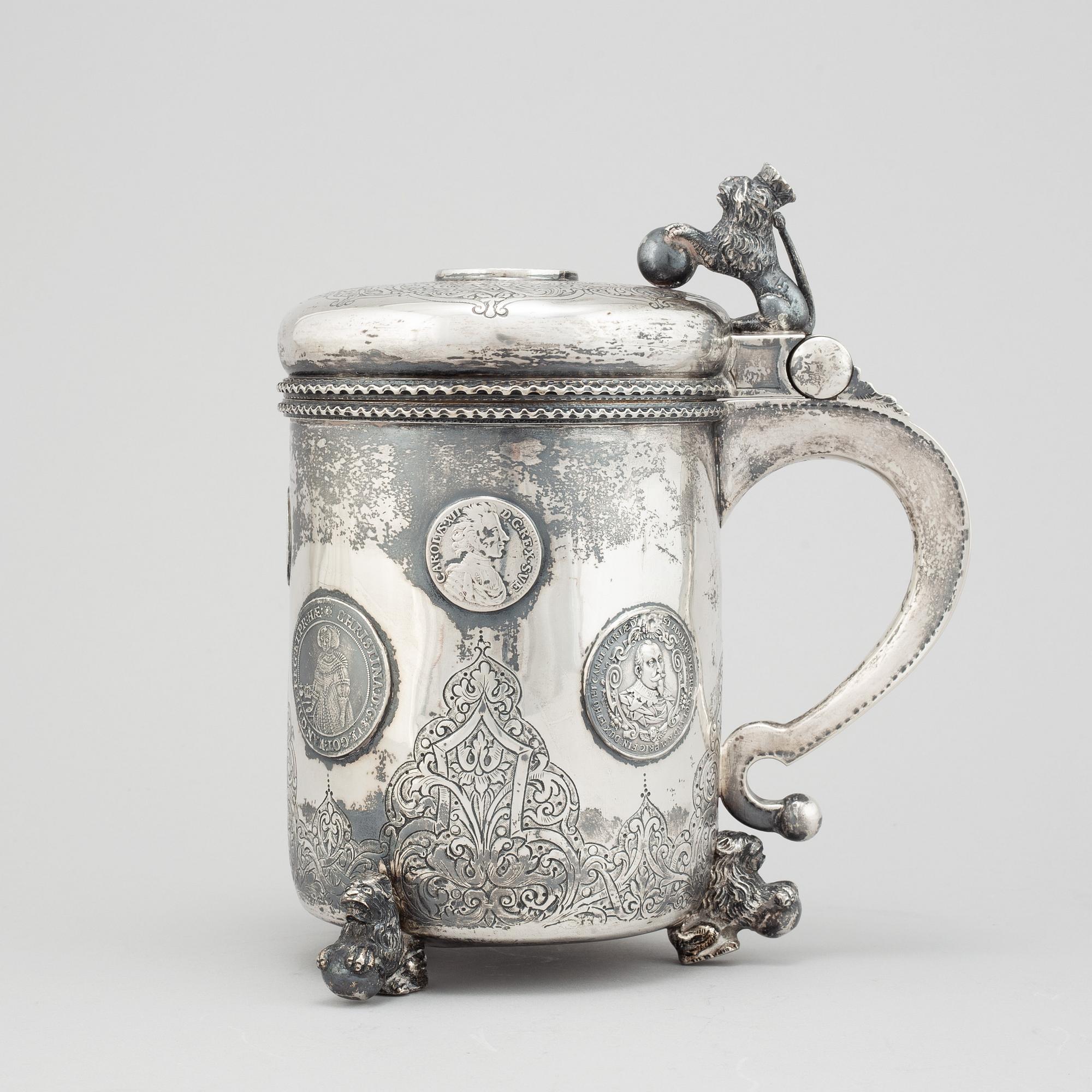A parcel-gilt silver baroque style tankard.