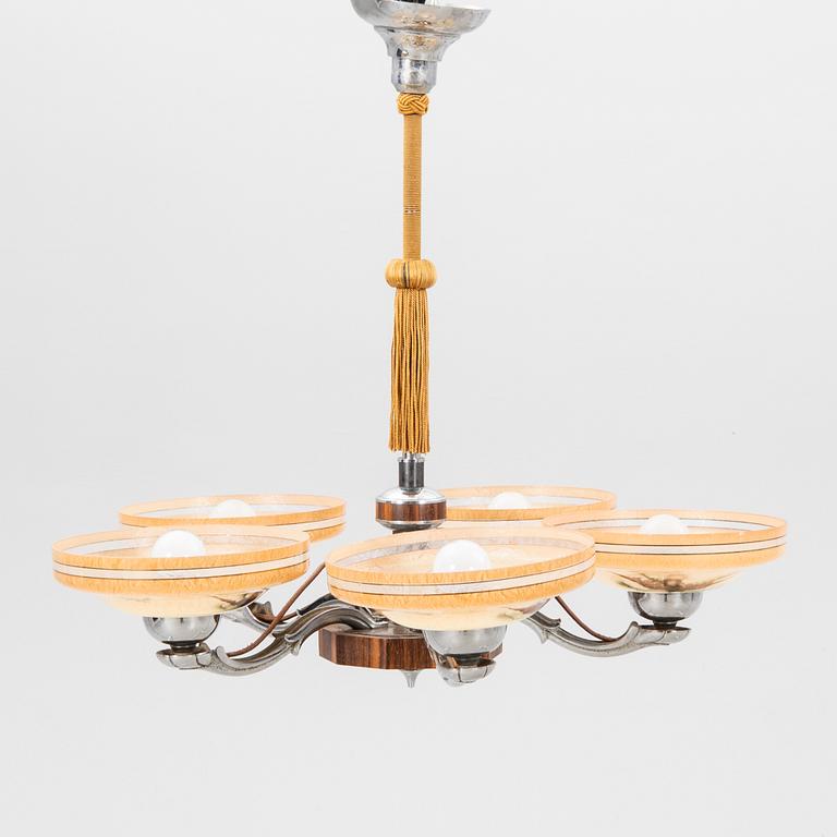 An Art deco 1940s ceiling pendant.