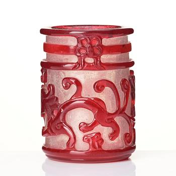 A ruby red overlay Beijing glass 'chilong' brush pot, with a seal mark.