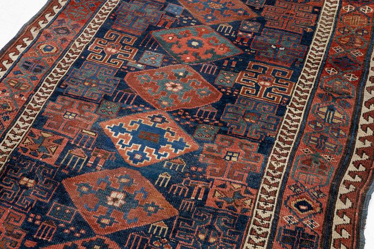 An antique Kurdish / Turkish carpet by the Herki Tribe, c 233 x 137 cm.