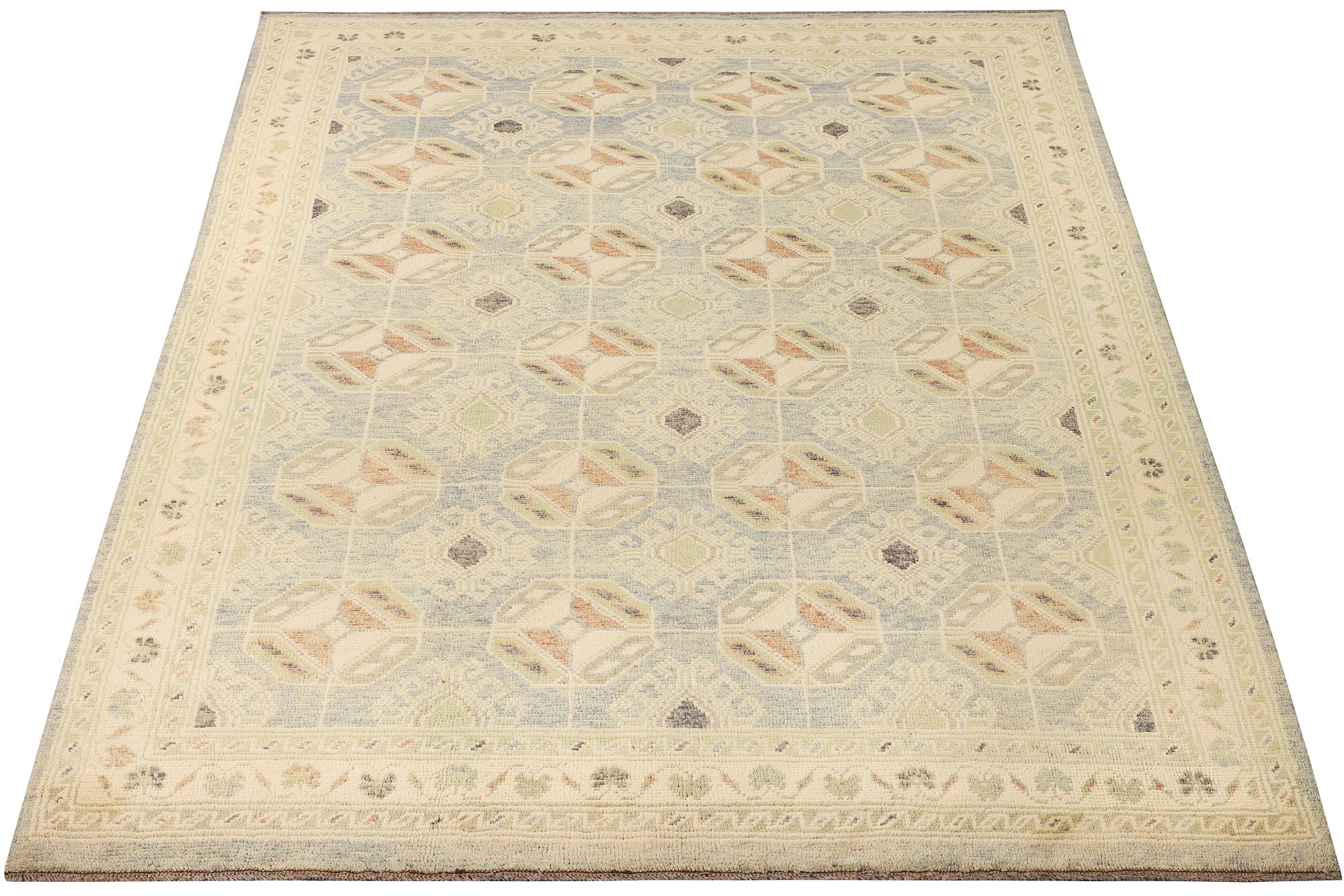 A Kazak carpet, c. 289 x 194 cm.