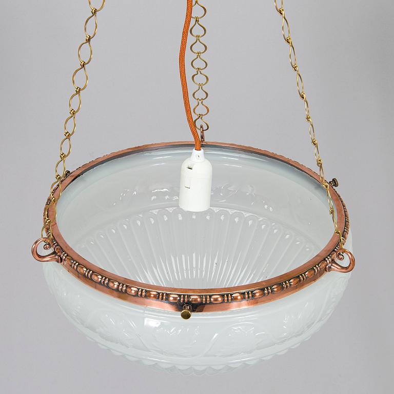 Kattovalaisin, 1900-luvun alku.