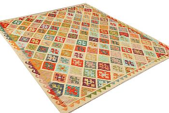 A Kilim carpet, c. 296 x 253 cm.