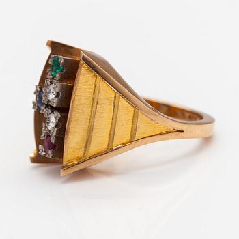 Leo Torikainen, A 14K gold ring with a sapphire, emerald, ruby and diamonds. Pirkan kulta, Tampere 1963.