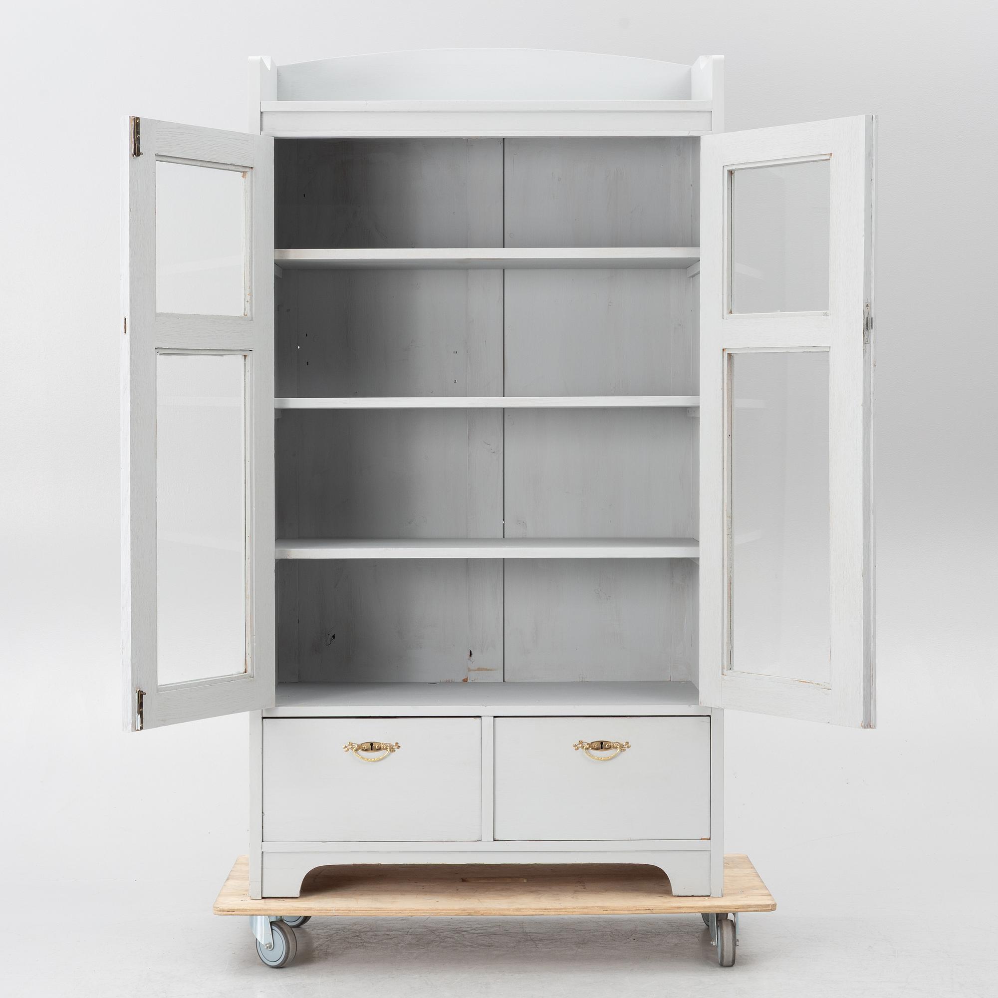 Display cabinet, early 20th century.