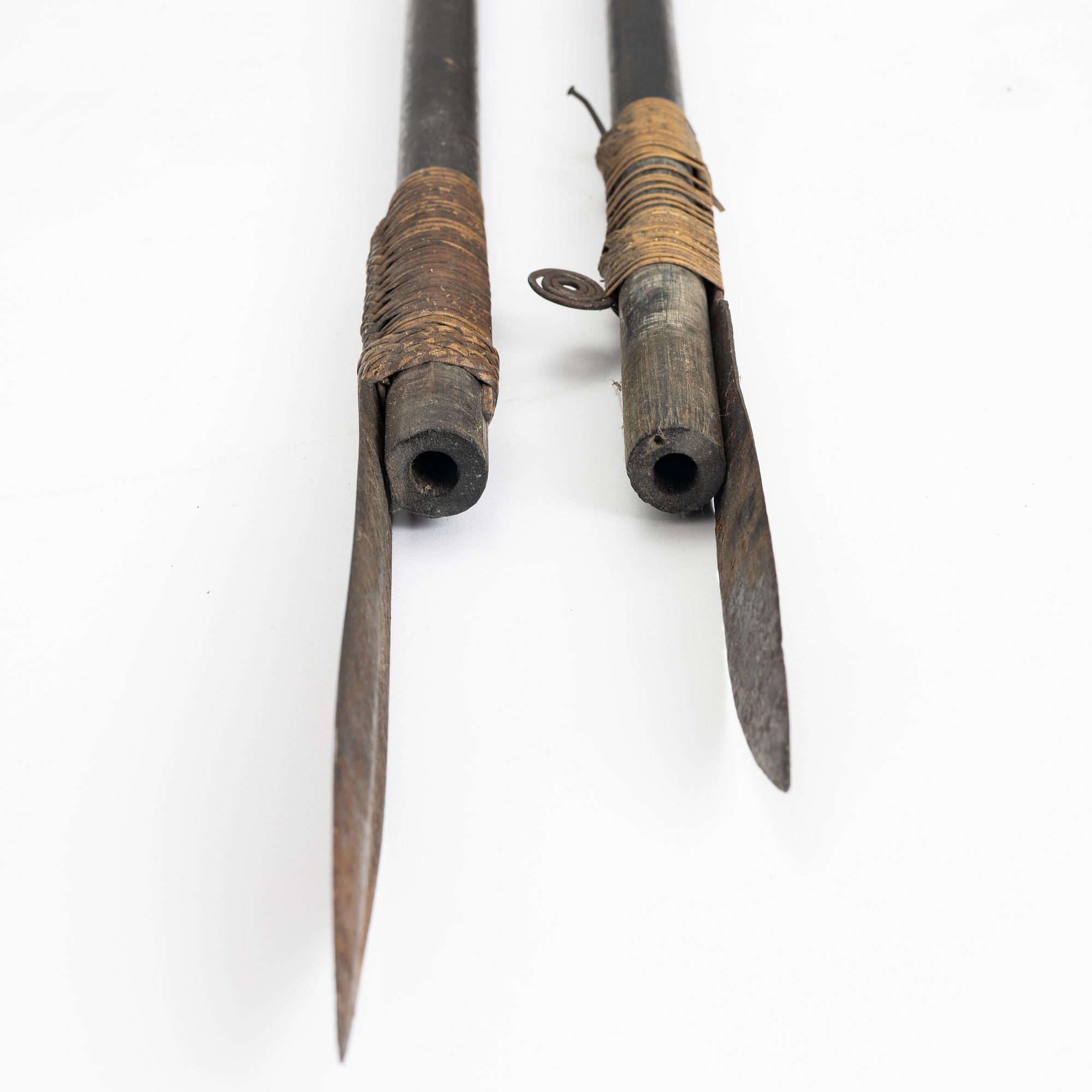 2 blowpipes, probably Dayak, Borneo.