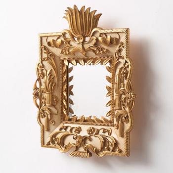 Dagobert Peche, a lacquered and gilded mirror executed by frame maker Max Welz, Vienna for the Wiener Werkstätte, Austria ca 1922.