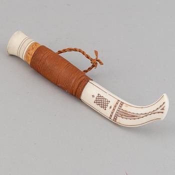 A Sami reindeer horn knife, signed MK for Martin Kourak.