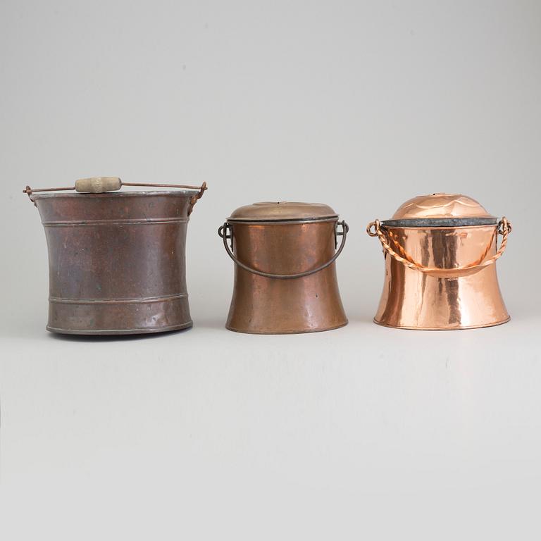 A COPPER BUCKET AND TWO MILK CHURNS, 19th century.