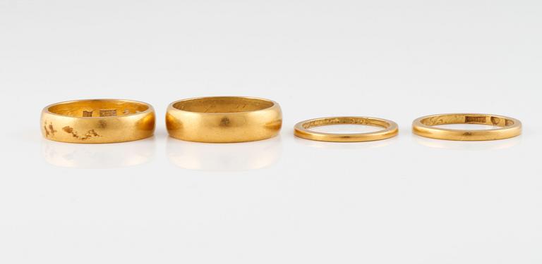 RINGAR, 4 st, 23K guld. Vikt 22,6 gram.