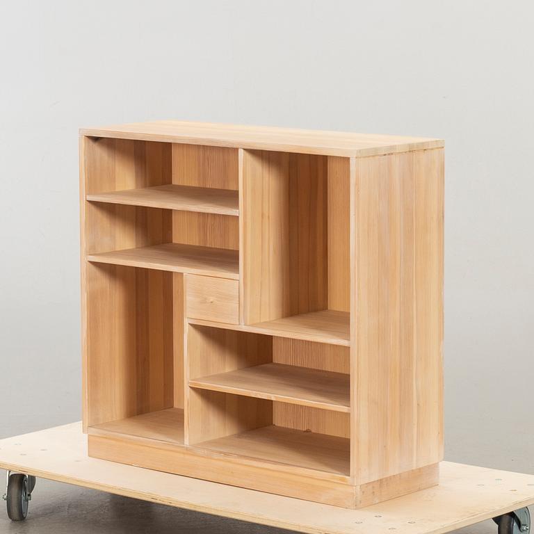 A SMAL SHELF "DICK" DESIGN OLOF PIRA.
