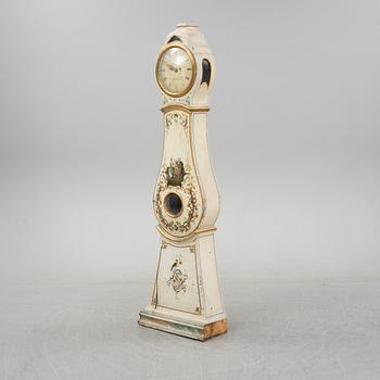 An 18th Century painted long case clock.
