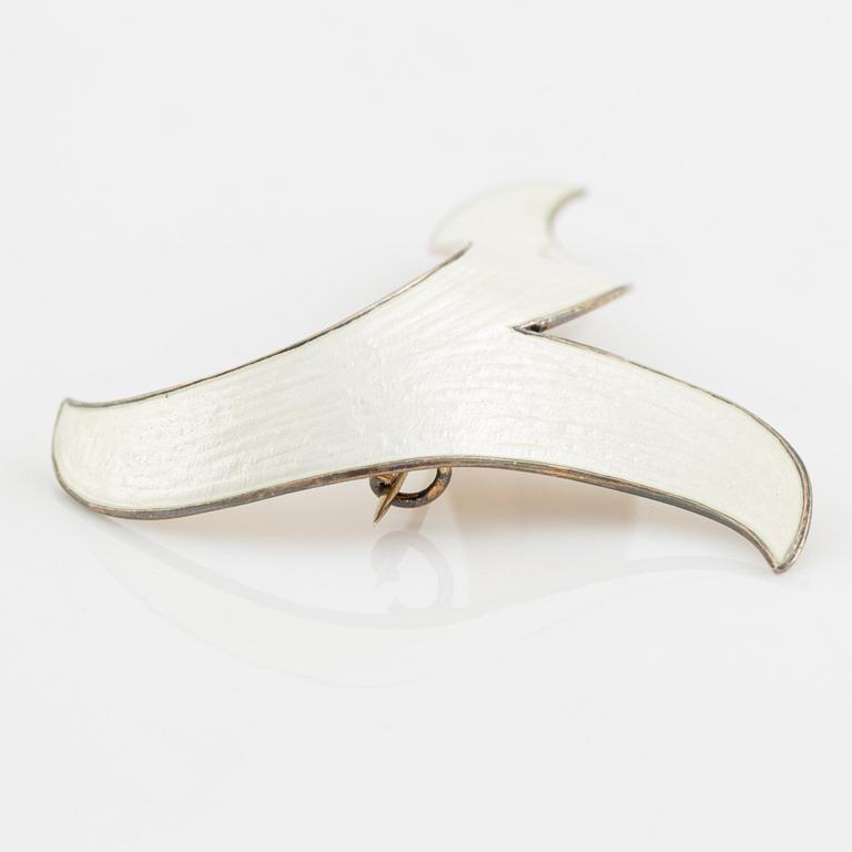 Brooch and a pair of earrings, sterling silver and white enamel. Norway.
