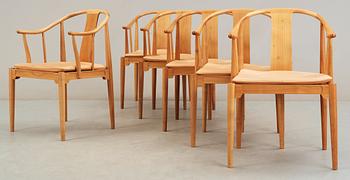 A set of six Hans J Wegner cherrywood and beige leather 'China chairs', Fritz Hansen, Denmark 1988 and 1994.