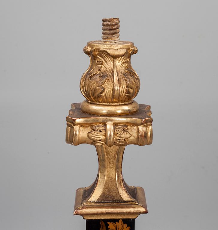 A pair of French Baroque circa 1700 candle stands.