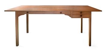 73. AN OAK DESK,