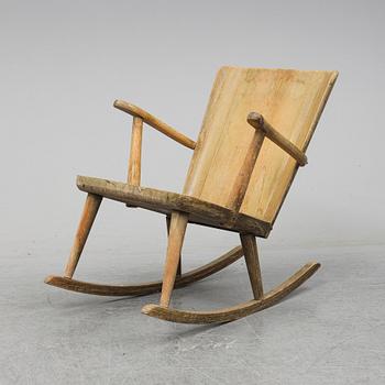 A second half of the 20th Century pine rocking chair by Göran Malmvall.