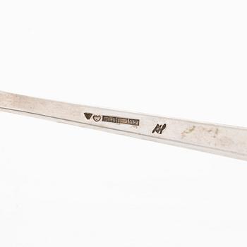 Tillander, Tarjoiluvälineitä, 9 kpl, hopeaa, joista viisi leimattu Matti Honkanen, Helsinki 1955-1962.