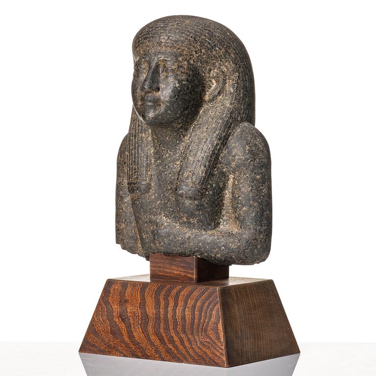 An Egyptian black granite bust of a man, 19th century or older.