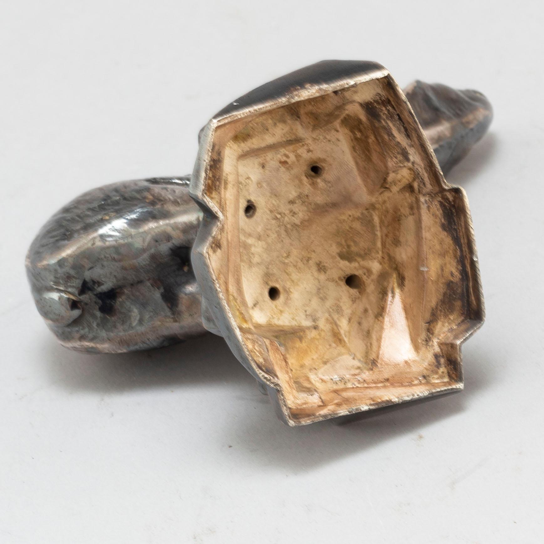 CHARLES SVEJSTRUP MADSEN, a silver plate paperweight.