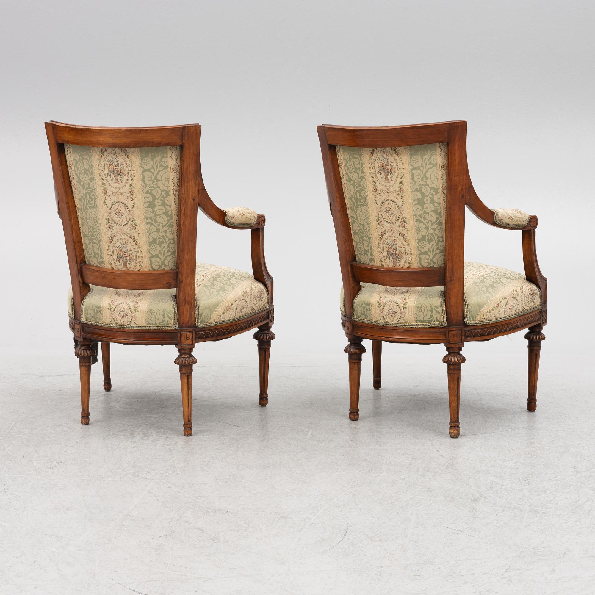 A pair of late Gustavian open armchairs, Stockholm, late 18th century.