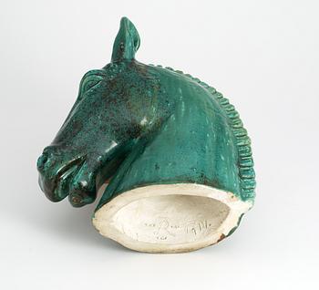 A Gunnar Nylund figure of a horse's head.