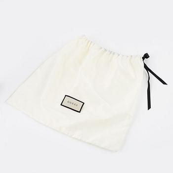 Gucci, a belt bag.