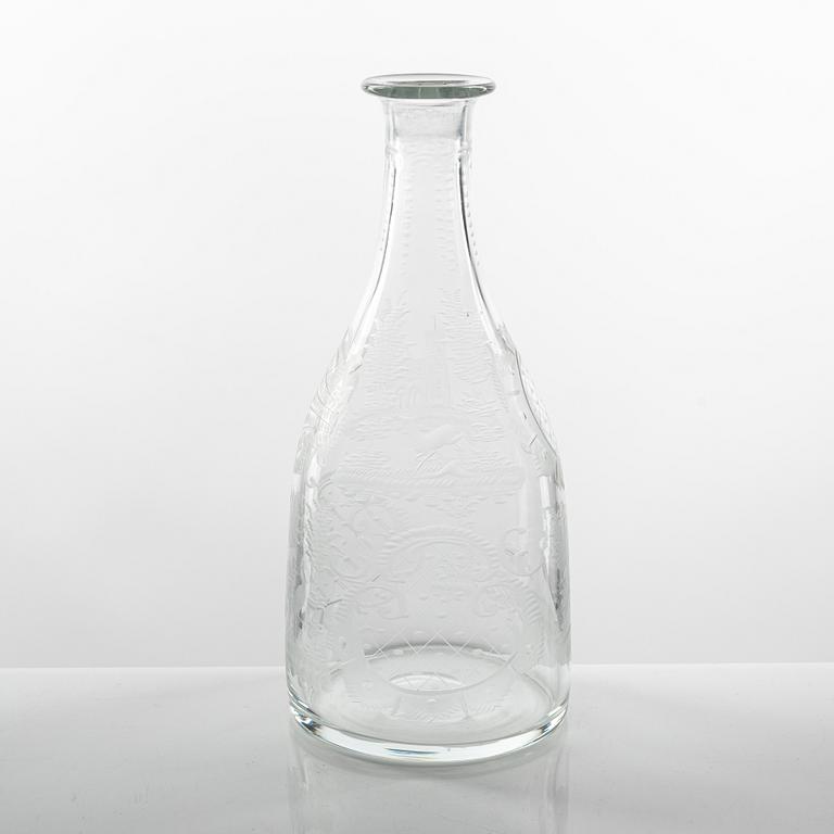 A set of three glass bottles and one decanter, 19th Century.