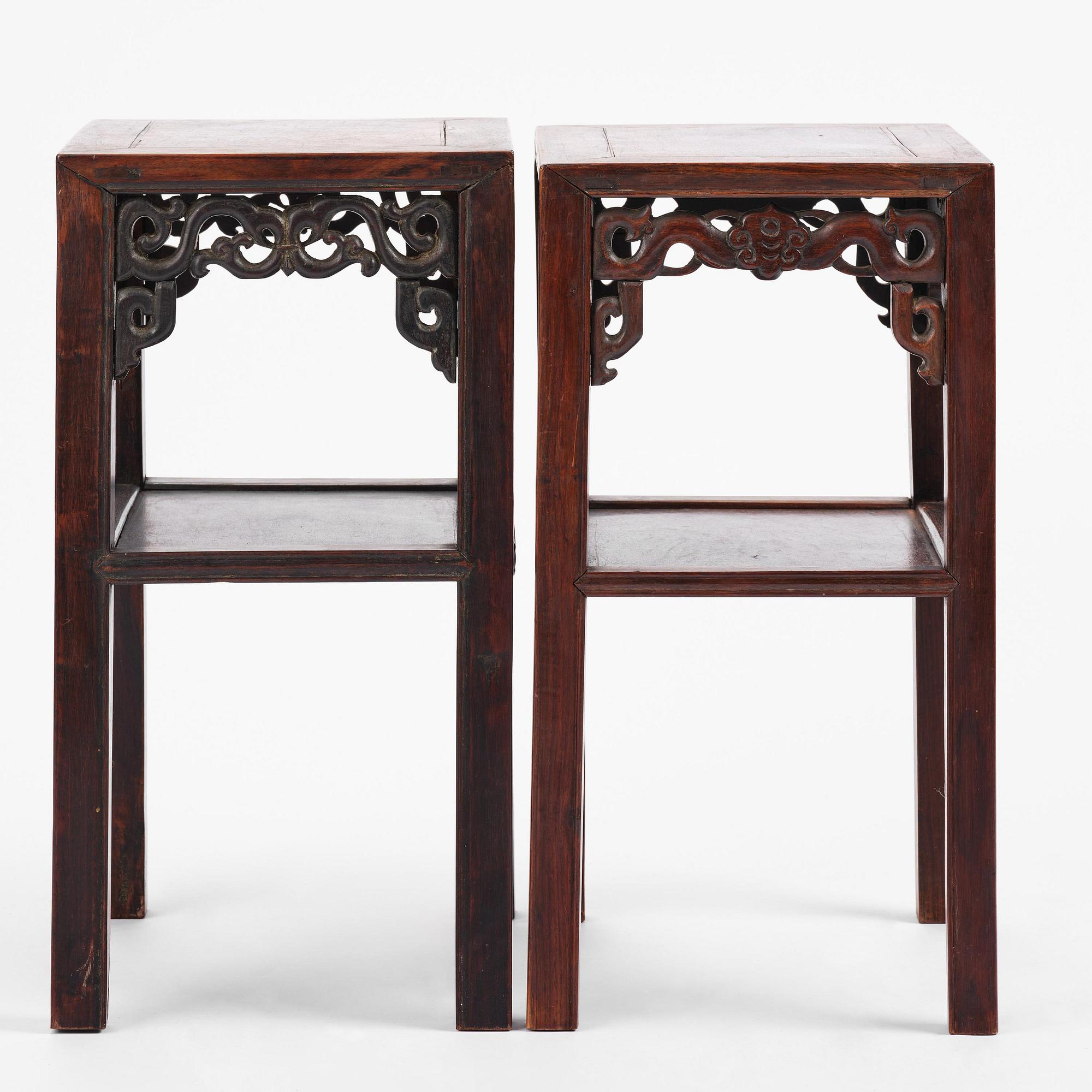 A set of two Chinese hardwood stands/tables, late Qing dynasty.
