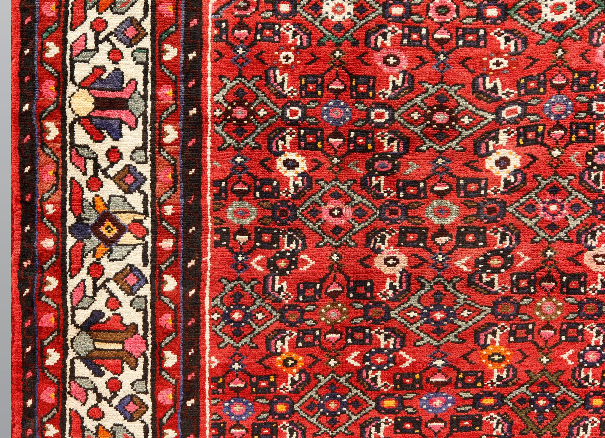 A Hosseinabad carpet, c 301 x 215 cm.