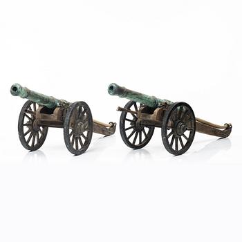 Modellkanoner ett par, 1900-tal.