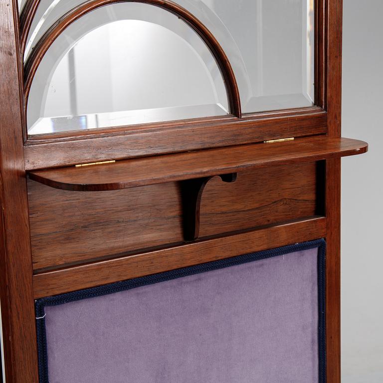 An early 20th century folding screen.