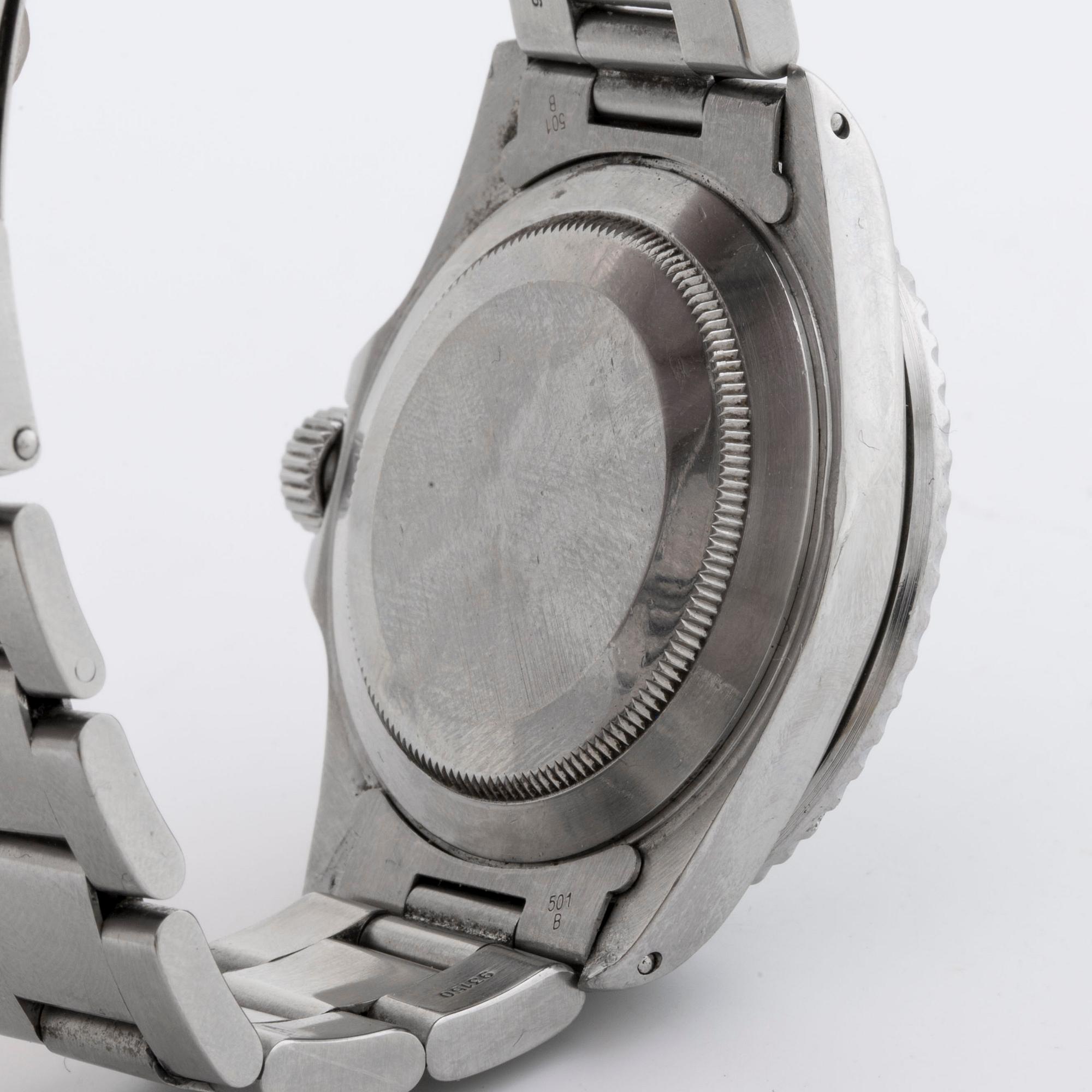 ROLEX OYSTER PERPETUAL DATE SUBMARINER WRIST WATCH, 40 mm.