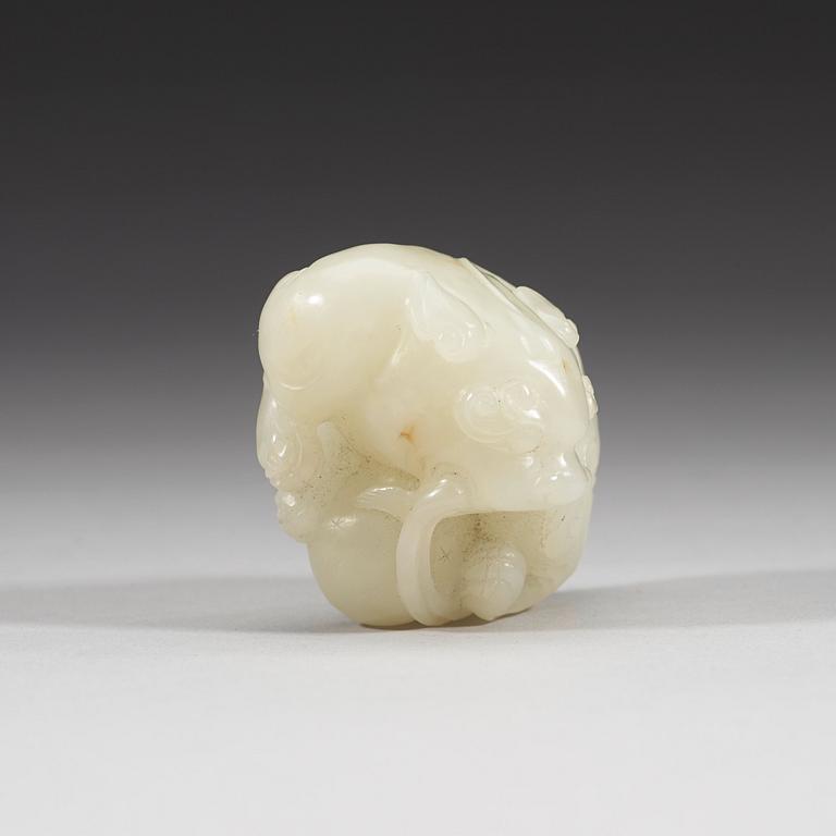 A carved nephrite figurine, presumably late Qing dynasty (1644-1912).