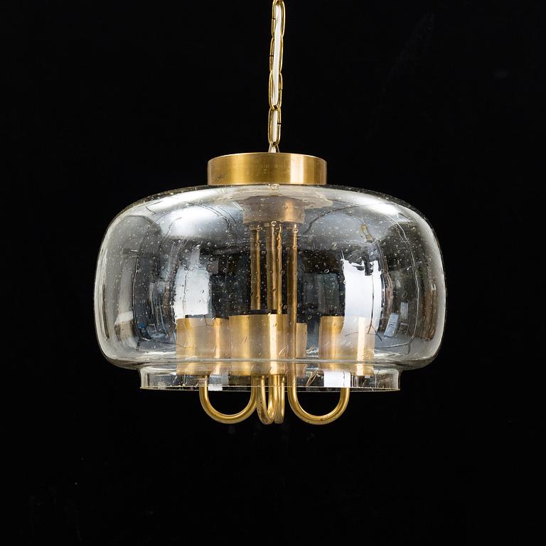 A 1960/70s glass and brass ceiling lamp.