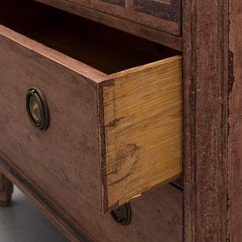 A pair of Gustavian style painted chest of drawers.