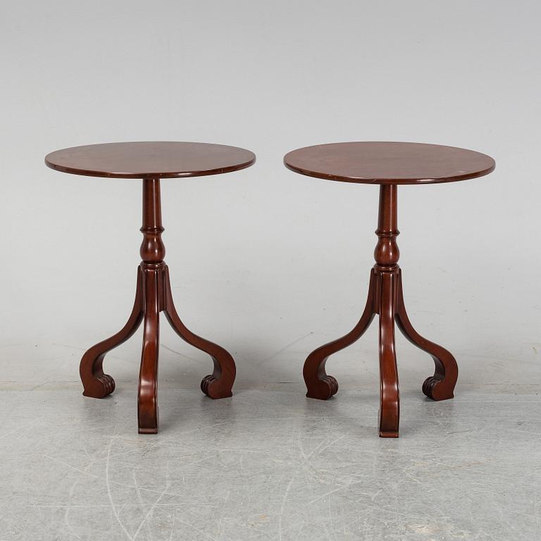 A pair of mahogany sidetables by Arthur Brett & Sons, Norwich, England.