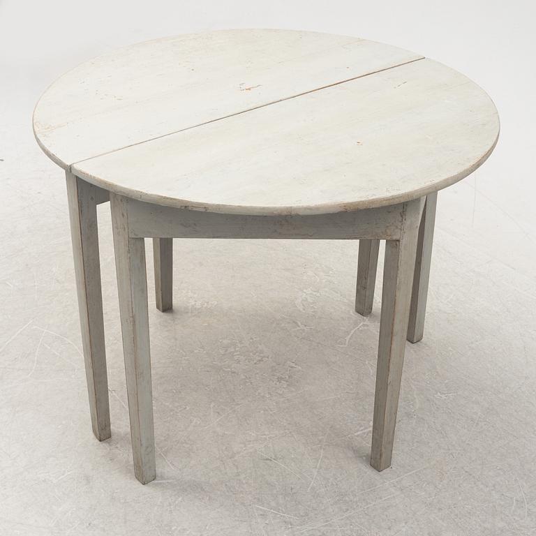 A pair of half circular tables, 19th Century.