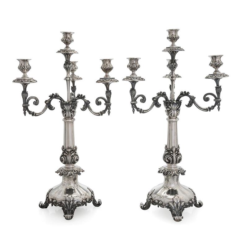 A pair of silver candelabra, maker marks of Carl Johan Tegelsten, Saint Petersburg 1850.