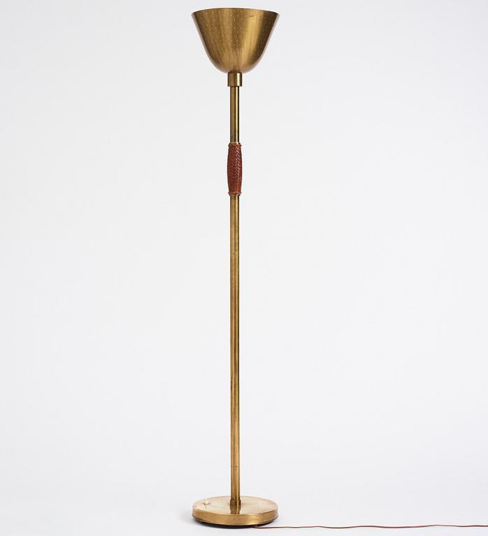 Carl-Axel Acking, a brass and leather floor lamp, designed for the Stockholm Association of Crafts in 1939.