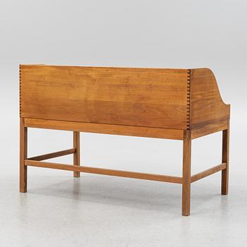 Andreas Hansen, a  secretary desk and an armchair by Hadstens, second 20th Century.