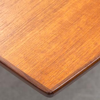 A 1950s/1960s teak and teak veneer table.