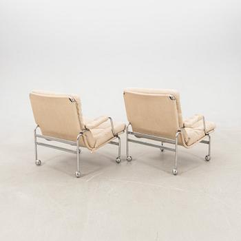 Bruno Mathsson, a pair of "Karin" armchairs for DUX, late 20th century.