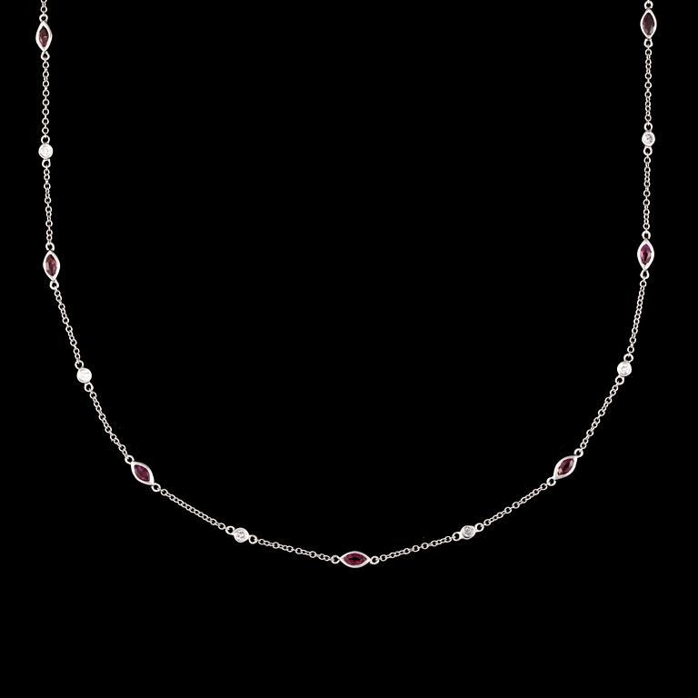 A ruby and diamond necklace.